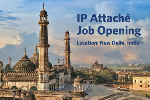 Text says “IP Attache Job Opening, Location: New Delhi, India”. Scenic cityscape photo of the Jama Masjid, Lucknow, Uttar Pradesh, in New Delhi, India.